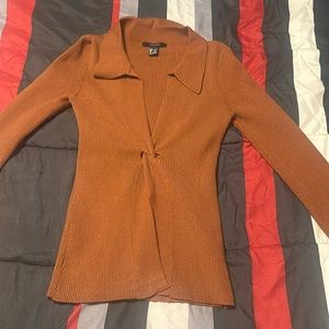 Long sleeve sweater shirt.